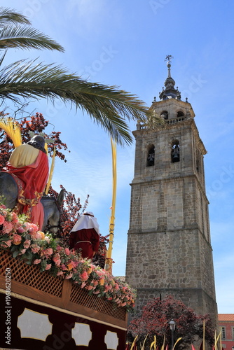 La Borriquita float beneath the Torre de Santa María la Mayor in Talavera de la Reina, Spain