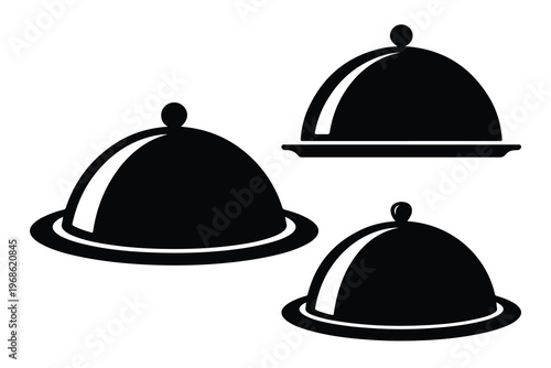 Three black cloche dishes on white background serving dishes