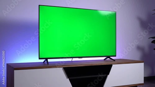 Modern television screen glowing with a vibrant green chroma key background, perfect for digital content creation and editing