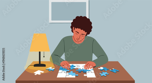 A person with curly hair sits at a desk focusing on assembling a jigsaw puzzle