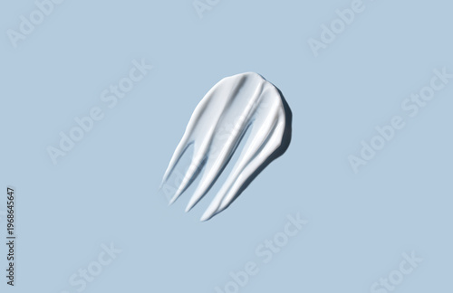 Cosmetic smears of cream texture on a pastel blue background. Skin hydration.