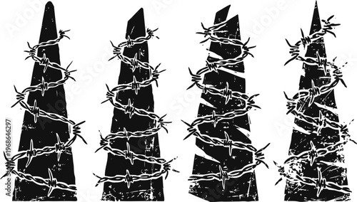 Four sharp black cones wrapped with twisted barbed wire isolated on white background