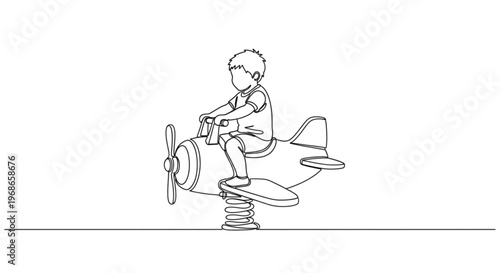 Young boy playing on spring-loaded airplane swing in playground  