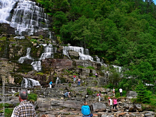 Norway - view of the waterfall Tvindefossen and tourists