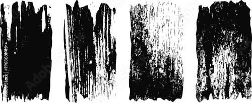 Set of four black grunge paint brush stroke textures on a white background for design and artistic effect