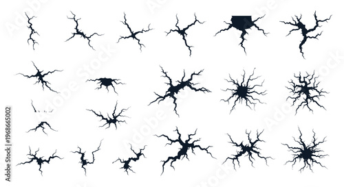 Large set of various black crack and fracture silhouettes on a white background for creating destroyed or aged surface effects.