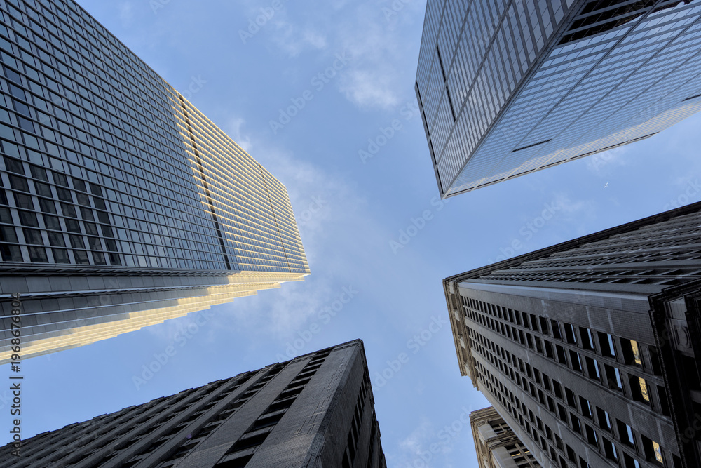 Φωτογραφία looking up at tall skyscrapers in downtown manhattan new york city financial dis