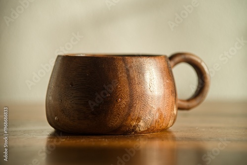 Rustic Wooden Cup in Warm Sunlight
