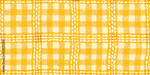 Close up of a yellow and white gingham checkered pattern textile