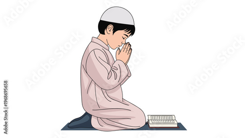 Young Muslim boy in a traditional white kufi and robe kneeling on a prayer mat while reading from the Quran with deep devotion.