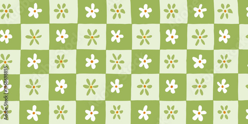 A repeating pattern of checkered squares with stylized white and green flowers