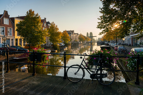 Leiden, Netherlands – September 20, 2024 - Rijn Bridge over Nieuwe Rijn Canal at Dawn. Rijnbrug over the Nieuwe Rijn at sunrise in Leiden, Netherlands
