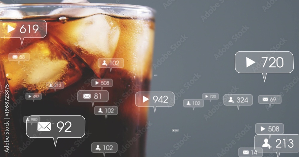 Fototapeta premium Showing cola glass, ice, condensation, rim glow in studio, alerts with icons and counts, copy space