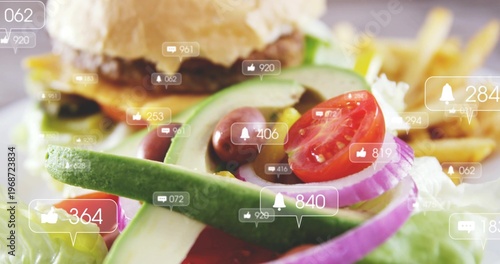 Displaying salad with avocado, cherry tomato, red onion on cafe table, with social bubbles