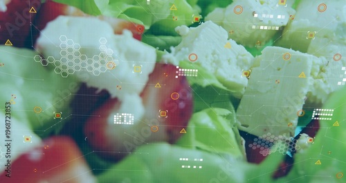 Displaying close-up salad at studio, with lettuce, cherry tomatoes, crumbled feta and HUD graphics