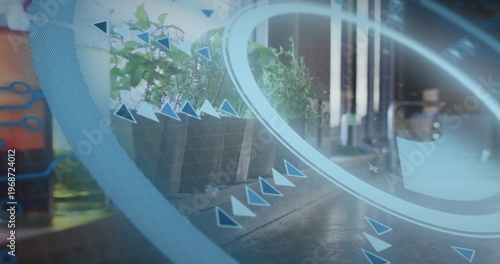 Floating faint AR ring and arrow markers hovering over sunlit floor by glass door, planter present