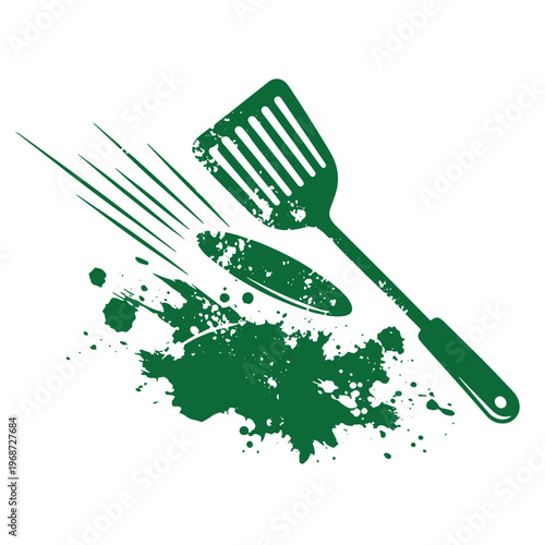 Green spatula and fork with paint splatter