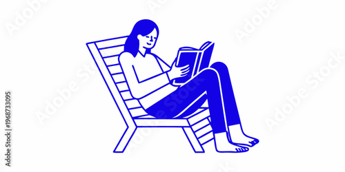 A woman relaxes and reads a book while seated in a lounge chair