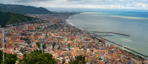 Densely populated areas of the Italian city of Salerno. Salerno is a city and port on the Tyrrhenian Sea in southern Italy, the administrative center of the Salerno province of the Campania region.