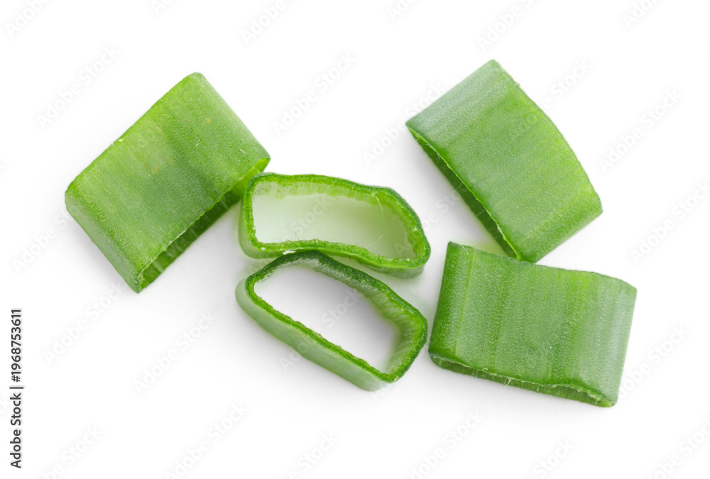 Obraz premium Pieces of green onion isolated on white, top view