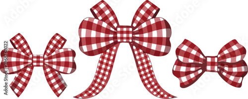 Three red and white checkered bows on white background