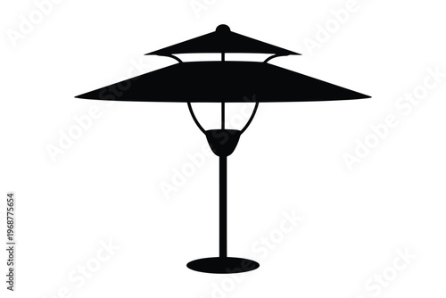 Silhouette of a black outdoor lamp post with a double-tiered canopy