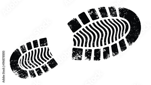 Grungy black textured footprint of a shoe or boot tread pattern isolated on a white background for crime or trail.