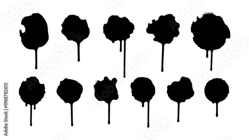 Set of black ink blots and paint drips for artistic design elements