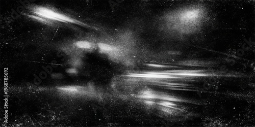An abstract black and white grunge background featuring dark storm clouds and a misty texture that blends smoke with a moody night sky for a dramatic nature backdrop
