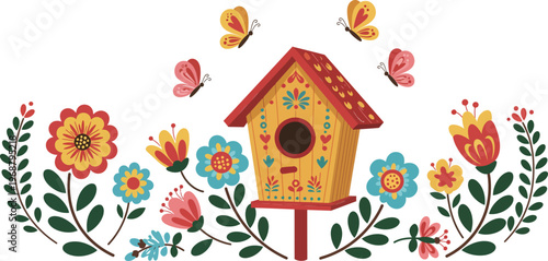 A small handmade wooden birdhouse with a hole nestles among spring garden flowers and green nature to create a decorative home for birds