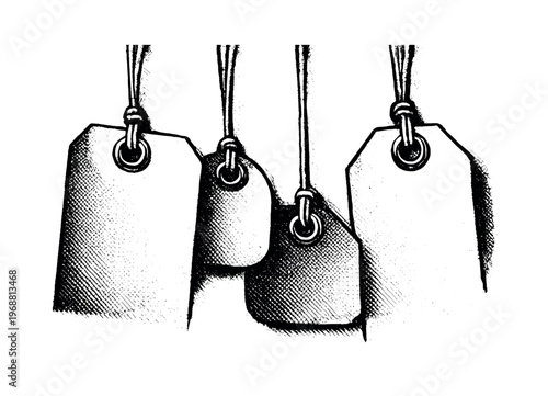 A close-up of hanging price tags attached to thin strings, tightly cropped and partially cut off by the frame,
