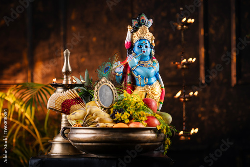 Vishu festival photo beautidul Vishu kani image with Lord Krishna statue with fruits and traditional lamp