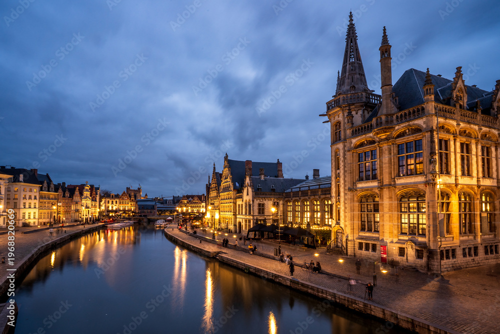 Fototapeta premium Night view of Graslei quay and the Old Post Office in Ghent, Belgium.
