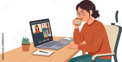 Woman working on laptop with a coffee cup on desk