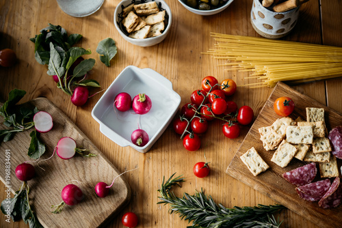 Cutting vegetables while cooking dinner. Healthy eating at home concept.