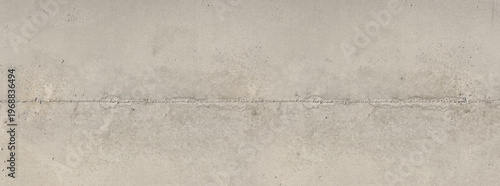 Concrete wall texture with rough horizontal seam for background