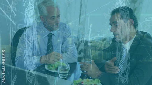 Animation of network of connections over caucasian businessmen in office