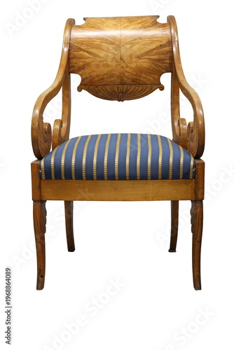 Beautiful vintage chair with elegant design and blue striped upholstery, showcasing craftsmanship from a bygone era