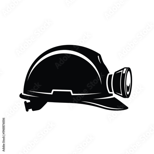 A miner wearing a hard hat with a lamp on the right side
