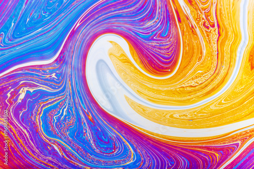 Close up on a soap bubble with random abstract forms and colors for background