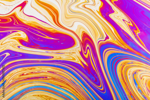 Close up on a soap bubble with random abstract forms and colors for background