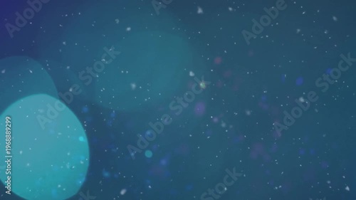 Animation of snow falling over moon and stars