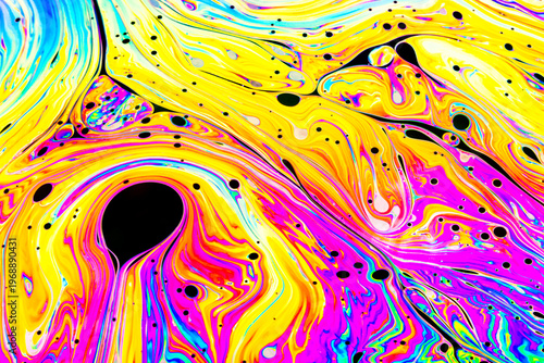 Close up on a soap bubble with random abstract forms and colors for background