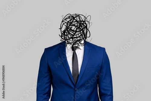 Frustrated man with nervous problem feel anxiety and confusion of thoughts. Mental disorder and chaos in consciousness. Indoor studio shot isolated on yellow background