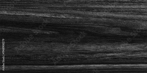 A dark grunge pattern of black and white fabric mixed with aged brown wooden texture creates a rough vintage surface material