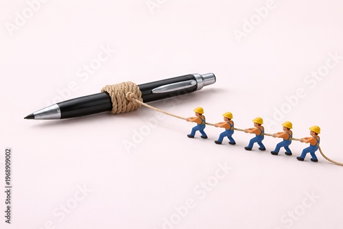 Mini Workers Pulling Pen With Rope Teamwork Effort Concept
