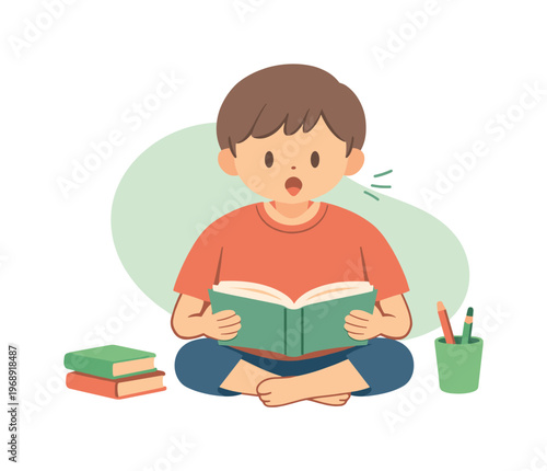 Young boy sitting cross-legged and reading a book aloud with an excited expression