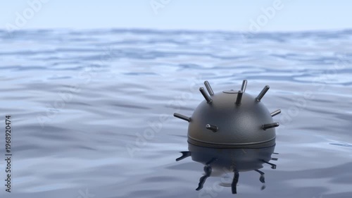 Moored naval mine floating in wavy water