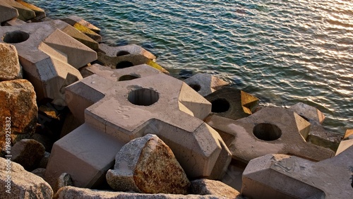 Seawall Coastal Defense Structure Breakwater Built with Concrete Slabs Protecting Yacht Harbor Marina Port Entrance
