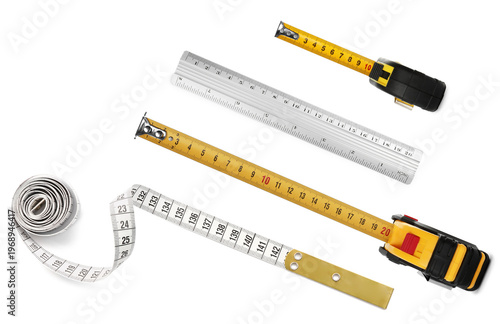 Cuadro en lienzo Measuring tapes and ruler isolated on white, set. Top view